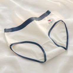 شورت نخی عروسکی سفید با نوار آبی